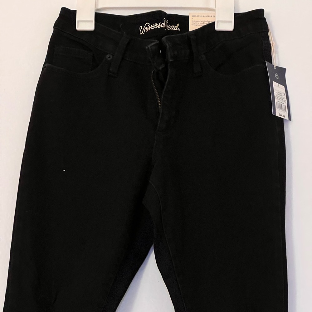 Black Mid-Rise Skinny Jeans | US 2 | Women’s